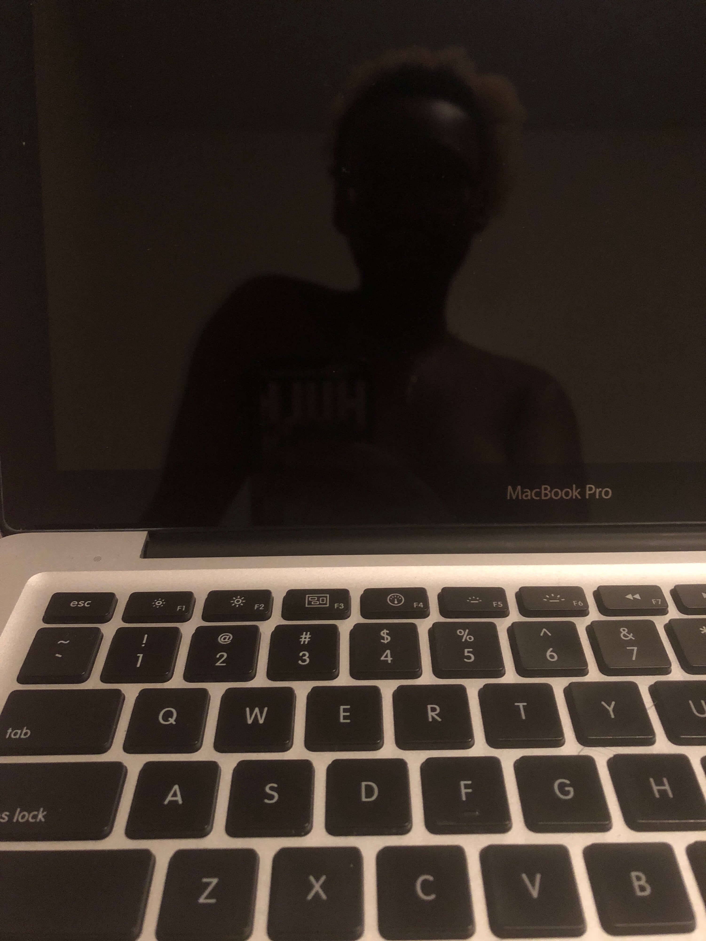 Cara’s reflection on a computer screen in Anonymous Writer